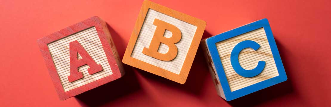 A, B and C wooden blocks.